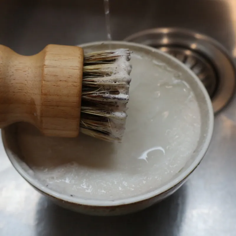 Scrub brush with dish soap