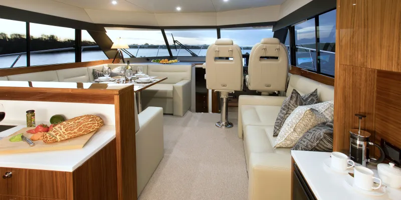 Step aboard and experience the wide walk around decks leading to a large front deck, the spacious saloon and the galley aft design with full-size fridge and a well-appointed pantry.