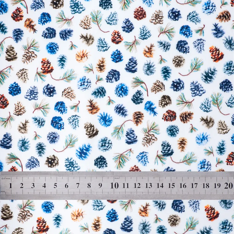 'Pinecone Party' fabric swatch with ruler for size reference