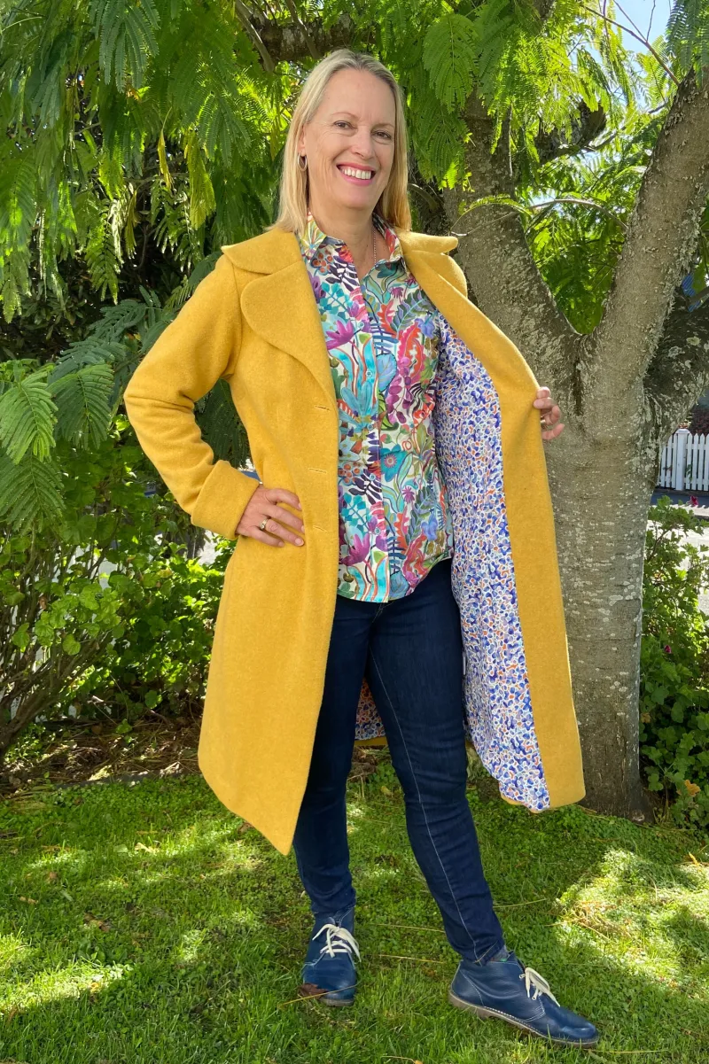 Alethea looking sunny in the Le Akaroa Coat 'Mango Tango'