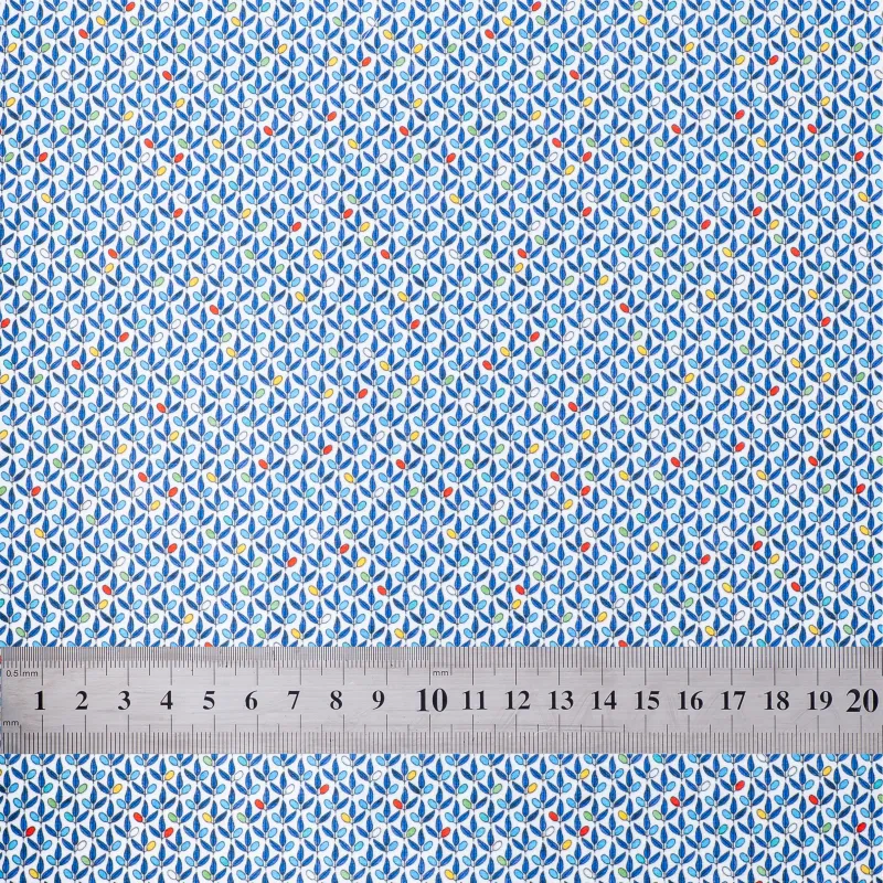 'Sea of Leaves' fabric swatch with ruler for size reference