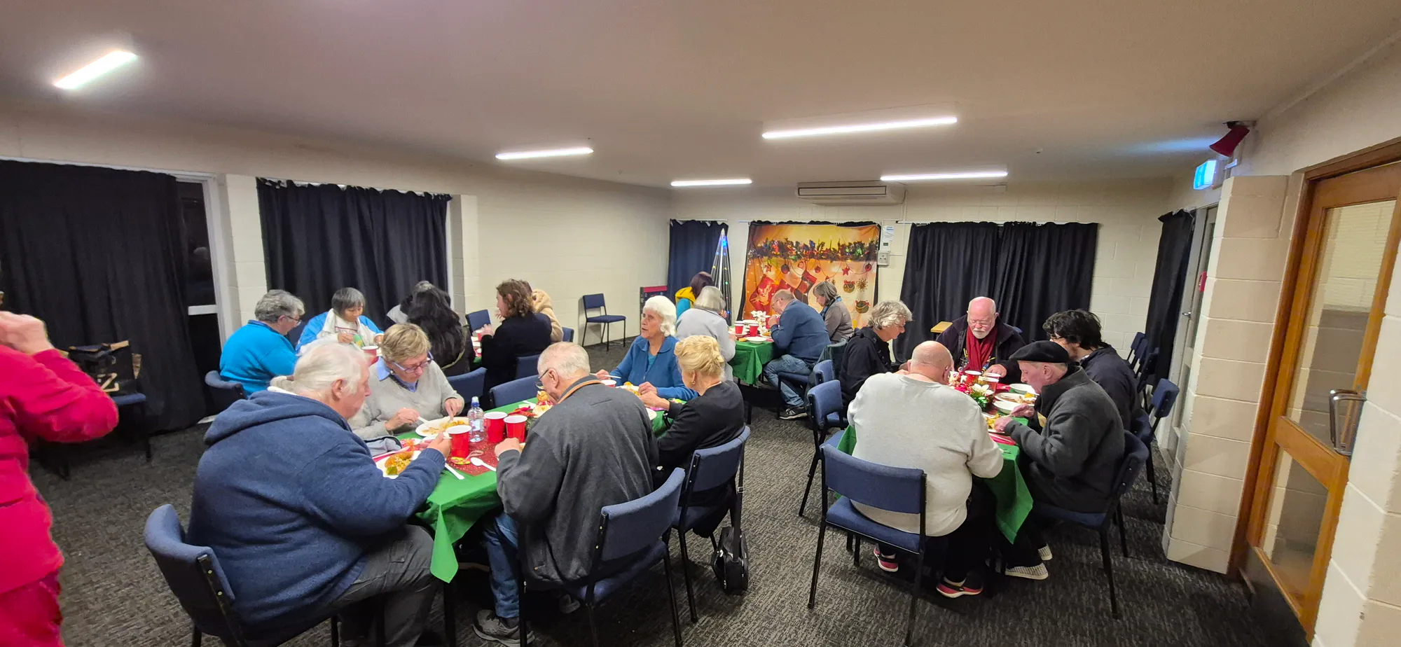 Members of the New Zealand Orchid Society enjoy good food and fellowship