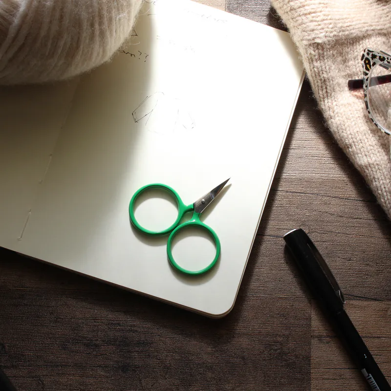 Green scissors with circle handles