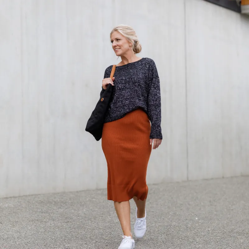 The Simple Sweater knitting pattern, made with silver and black yarn held together