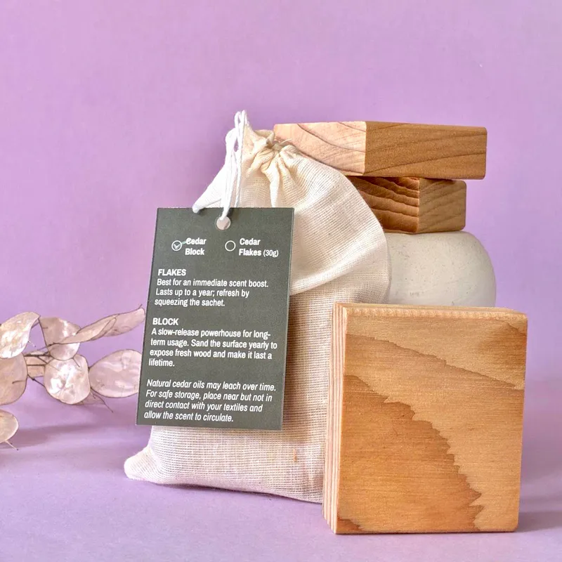 Himalayan cedar blocks. One is positioned in front and it's about the size of a bar of soap