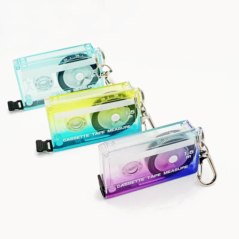 A collection of three cassette tape measures