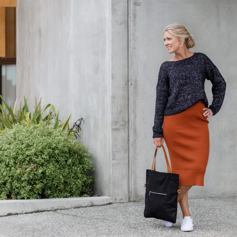 The Simple Sweater knitting pattern paired with a knit skirt