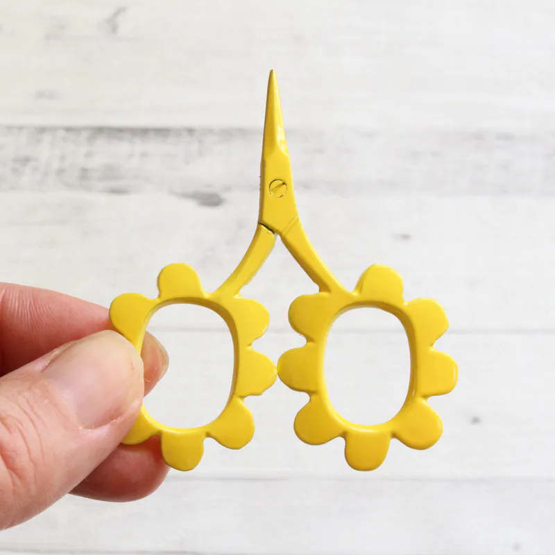 Yellow flower shaped scissors