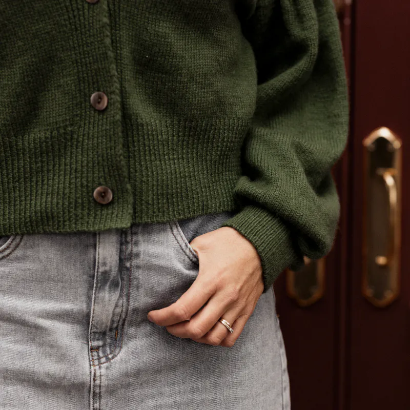 The hem and cuff edges on the Gather Sleeve Cardi are knit using the Italian Bind Off method for a rounded edge.