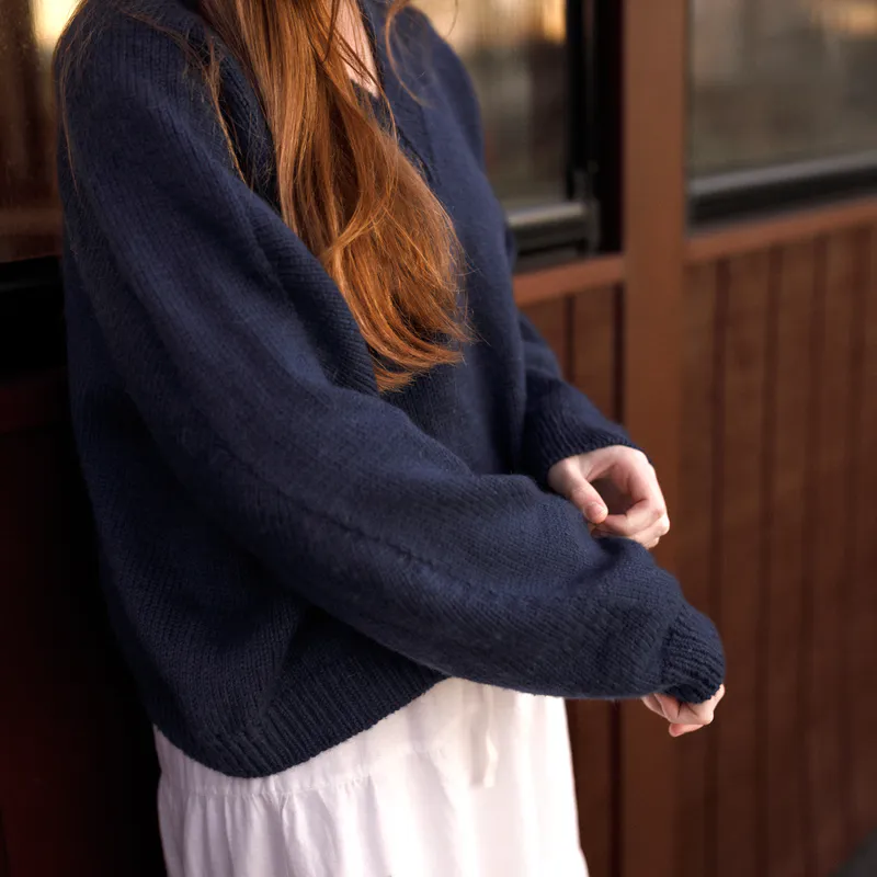 The seamless sleeve detail of the Ridgeline Sweater knitting pattern. It runs from the neckline to the cuff using a unique construction method