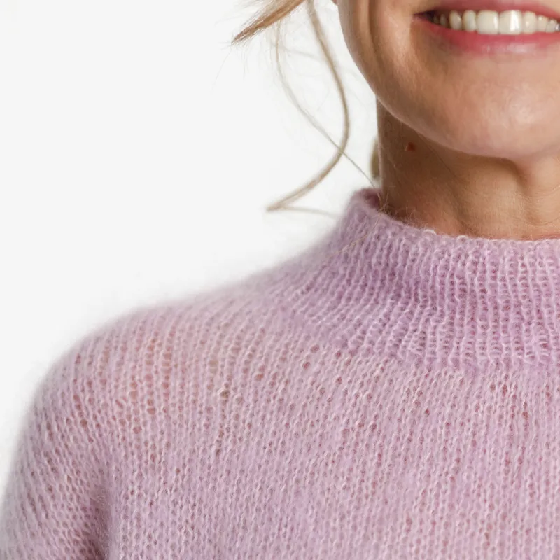 High neckline (turtleneck) on a hand-knit mohair sweater