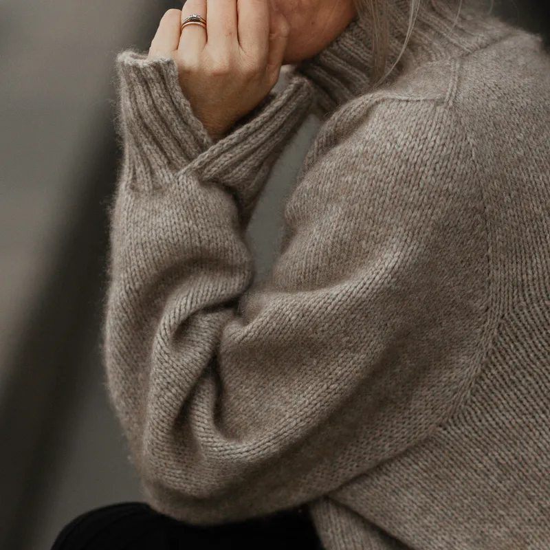 The split cuff of the Core Sweater knitting pattern. It gently overlaps at the top of the hand for interesting, ribbed detail