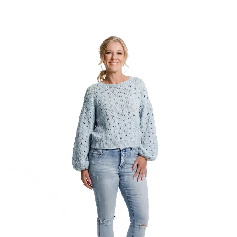 Front view of the Holey Moley Sweater knitting pattern