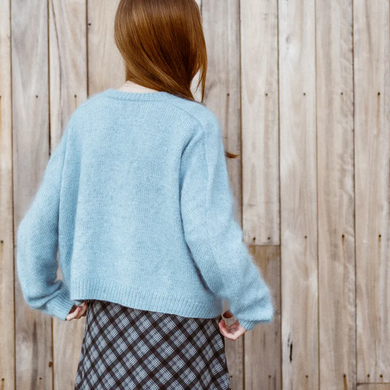 A back view of the Ridgeline Cardigan knitting pattern