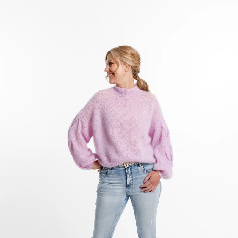 Front view of the Plait Sleeve Sweater knitting pattern