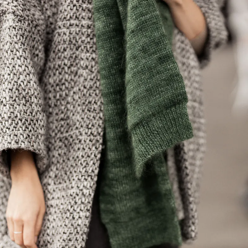 The ribbed edge of the Finding Calm Scarf knitting pattern