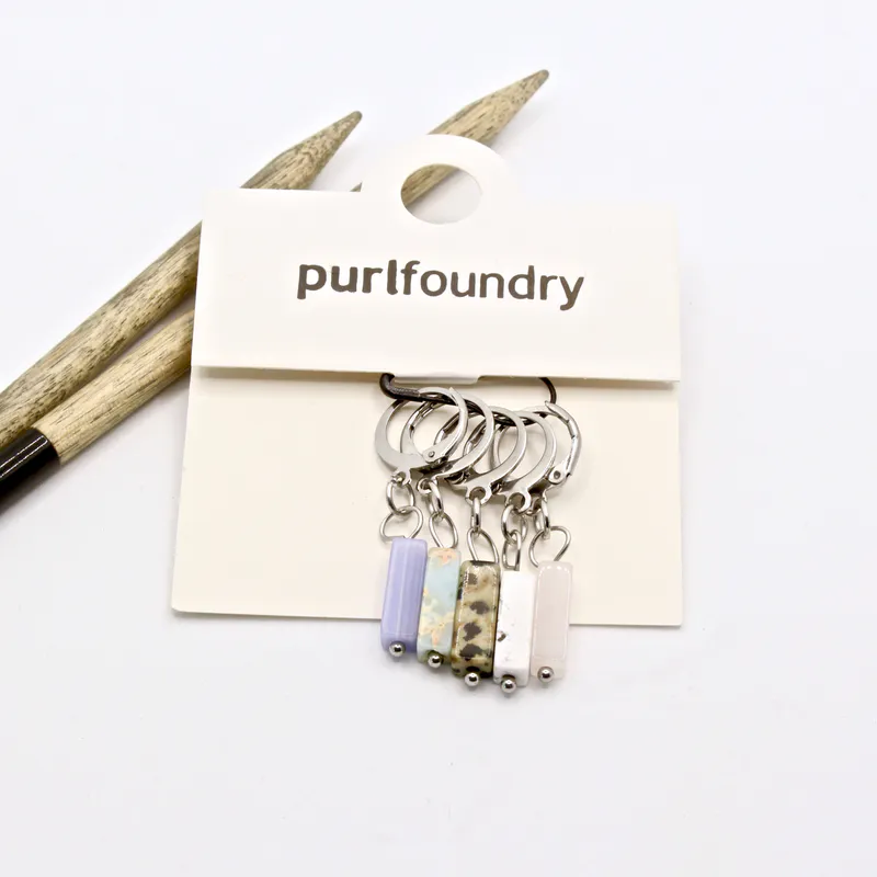 Stone inspired stitch markers in light tones