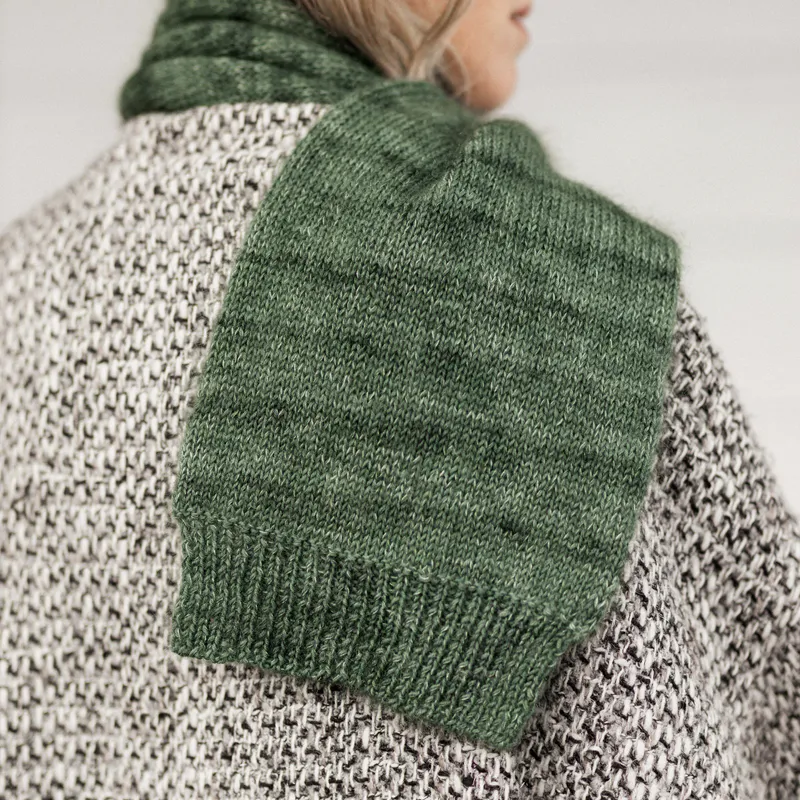 The ribbed edge of the free Finding Calm Scarf knitting pattern