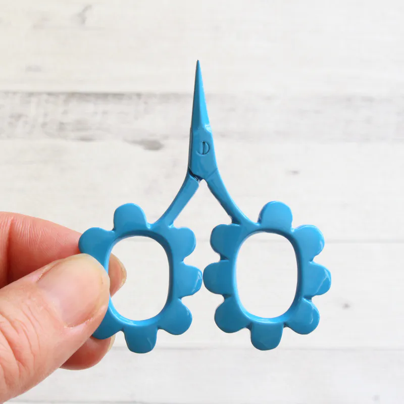 blue flower shaped scissors