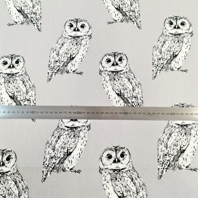 grey canvas fabric with black and white owls