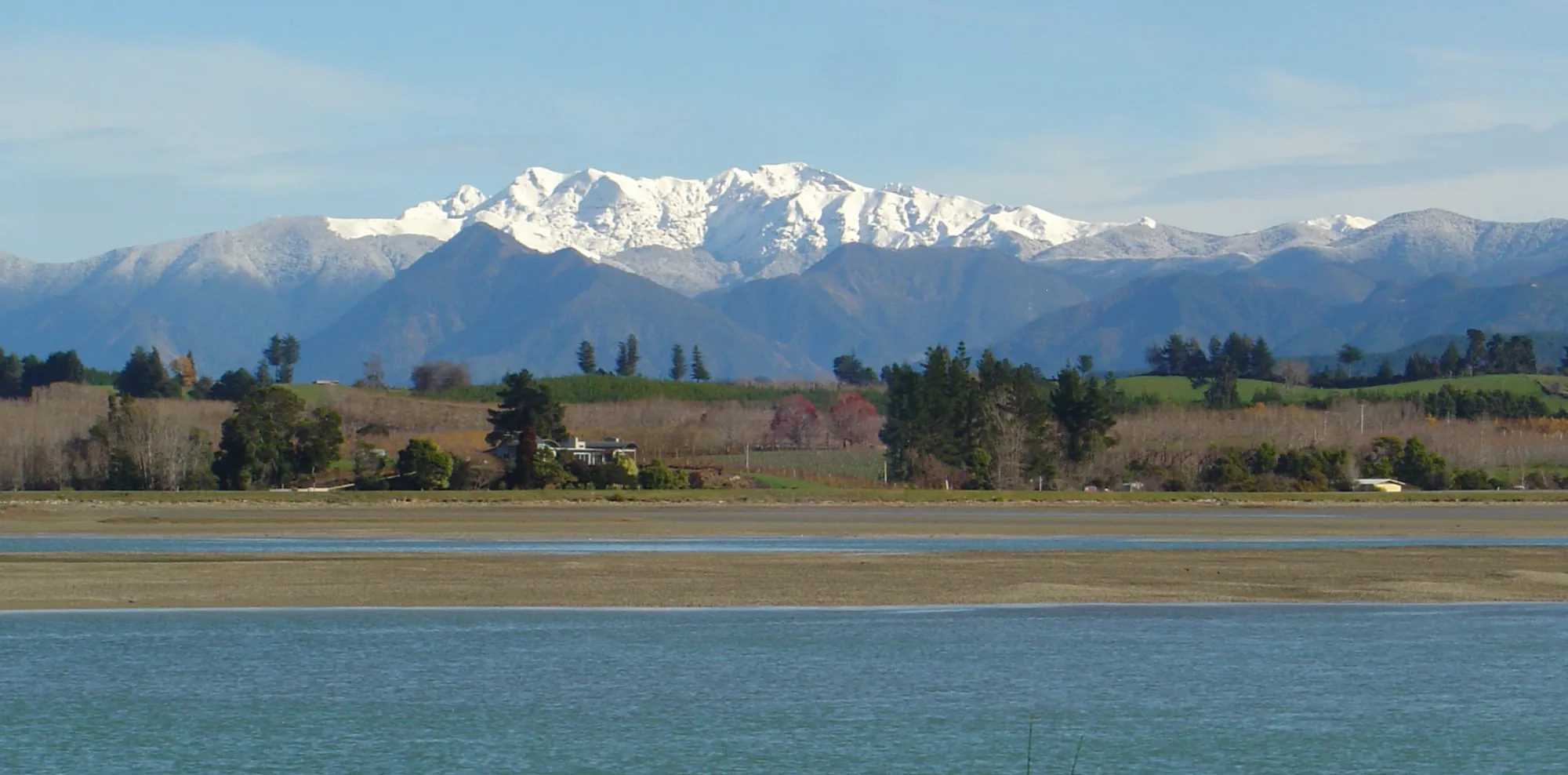 Snow-capped Mt Arthur across Moutere Inlet