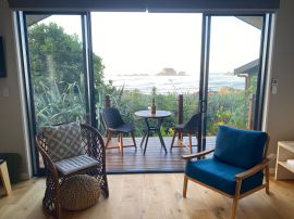 View from breakfast room inside The Bay House Westcoast NZ