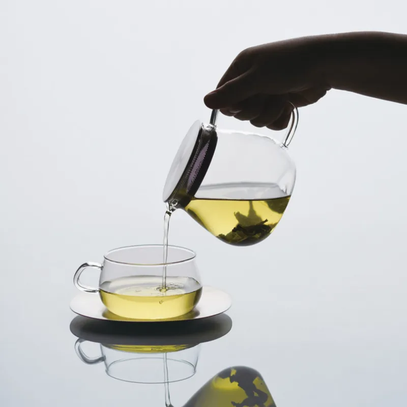 Kinto Unitea One Touch Teapot pouring brewed tea