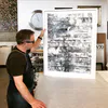 An artwork that is stitched onto the backing board for a 'floating' look