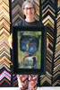 painting framed in a stylish black combination