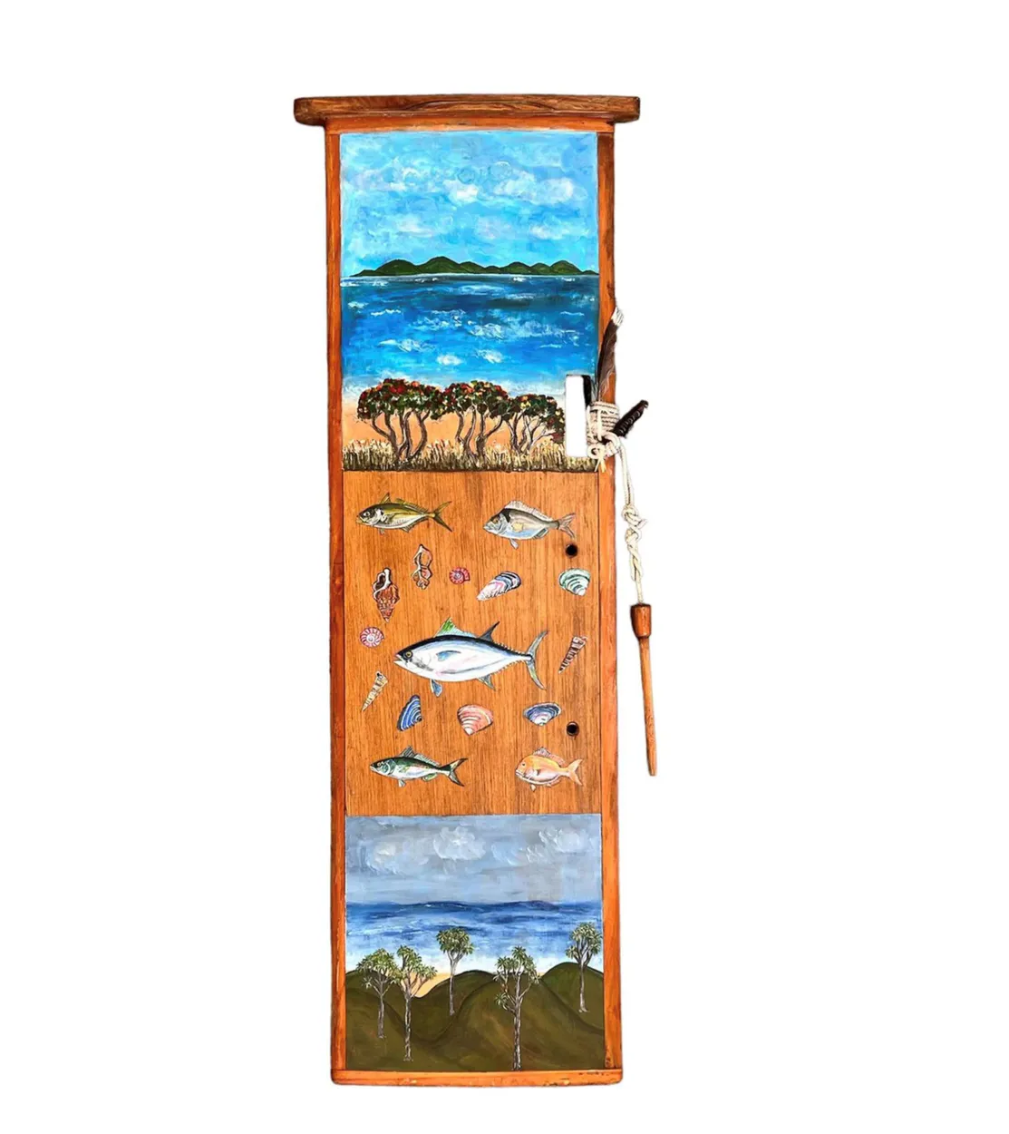 Artwork on an old salvaged centre board from Kauri Yacht by Chrissie Burnside, available at The Little Gallery in Tairua