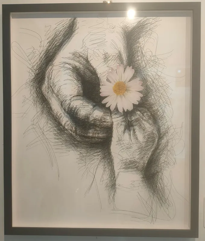 A painting of an adult holding a childs hand with a daisy by Artist Lisa Grennell available at The Little Gallery in Tairua