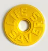 An original over-sized sculpture of a yellow Life Saver candy by Clint C, available at The Little Gallery Whangamata