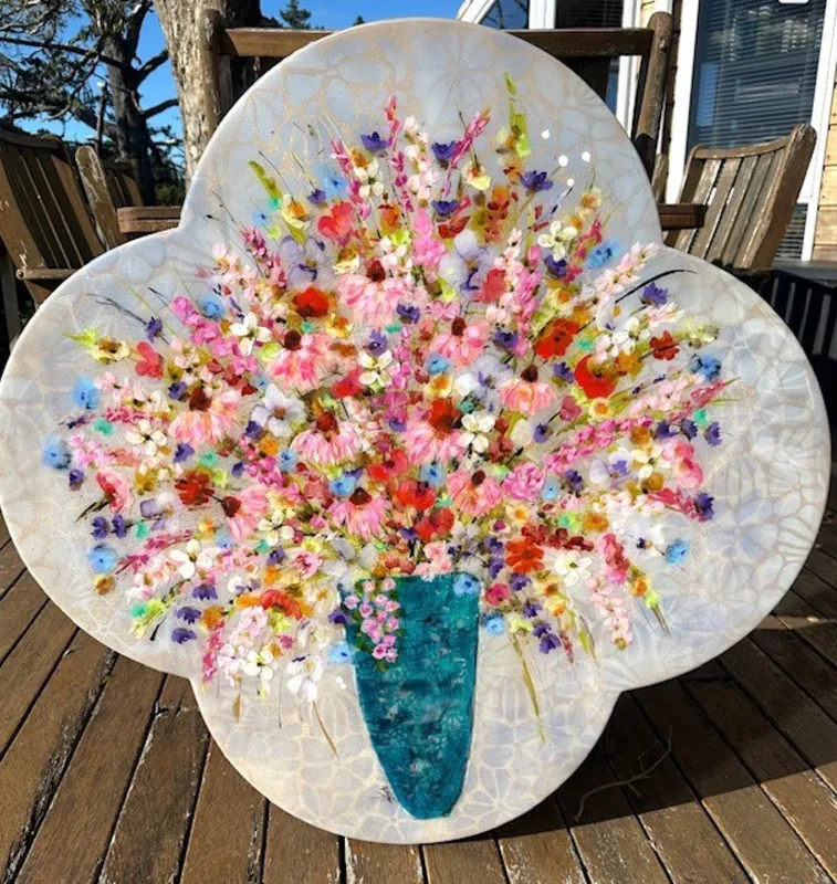 A bright burst of flowers in a vase on a quatrefoil canvas by Kristin Hyde, available at The Little Gallery Whangamata