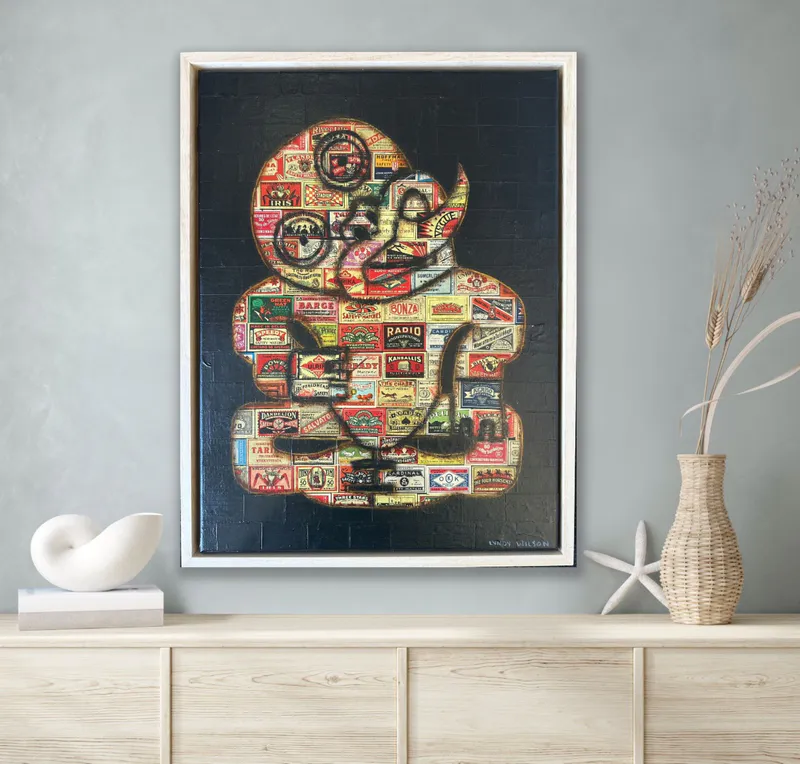 Matchboxes used to create a hanging wall art of a Tiki by Artists Lyndy Wilson available at The Little Gallery in Whangamata