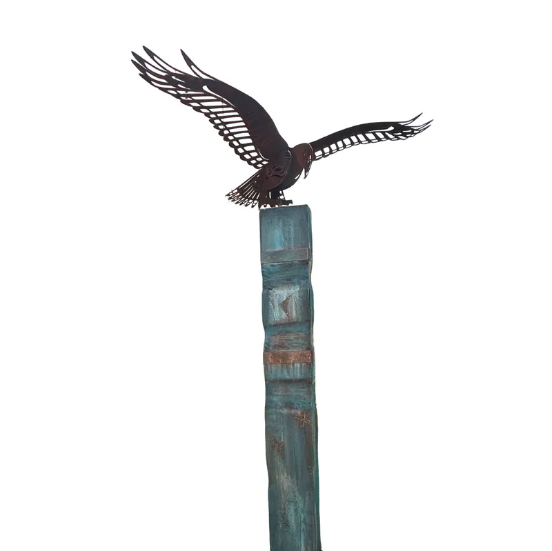 Large wooden totem with large corten steel Kahu by Rustic Soul Sculptors available at The Little Gallery in Tairua