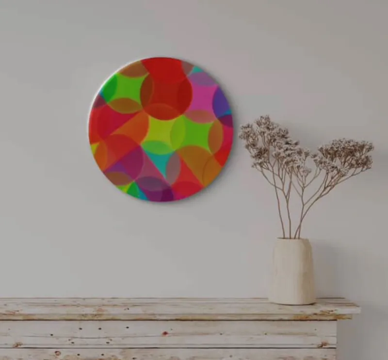 A bright circular resin painting by Pam Wildbore available at The Little Gallery in Whangamata