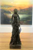 An elegant fabric and Paverpol sculpture of a lady in a dress by Shona MacDoland, available at The Little Gallery Tairua