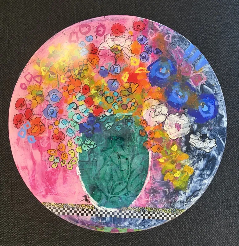 A beautiful floral side table with resin coating by Kristin Hyde, available at The Little Gallery Whangamatā