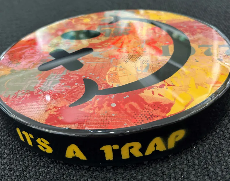 'It's a Trap' title on side of Graffiti Pop Art resin coated artwork by Random Guy, available at The Little Gallery Whangamata