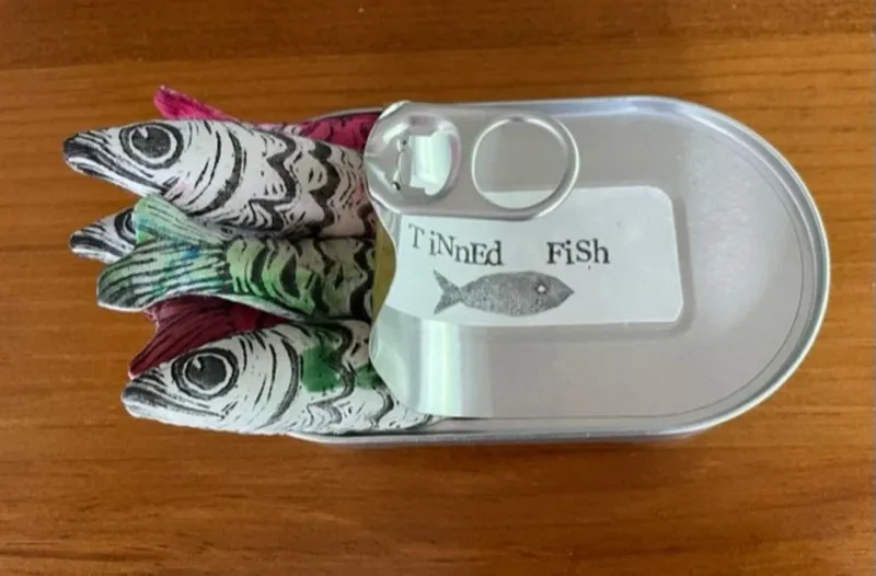 A quirky Mixed Media artwork of fish in a tin by Sue Preston, available at The Little Gallery Tairua