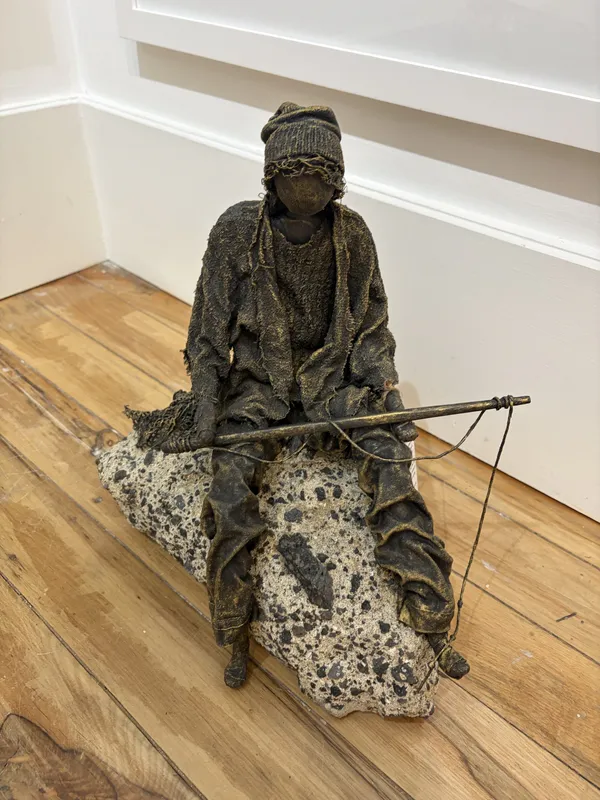 Fabric and Paverpol Fisherman sculpture by Shona MacDonald, available at The Little Gallery Tairua