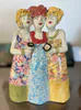 A joyful Ceramic sculpture of 3 woman friends together by Mandy Olson, available at The Little Gallery Whangamata