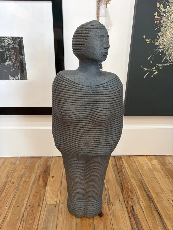 A handmade coiled clay figure by Ian Webster, available at The Little Gallery Tairua