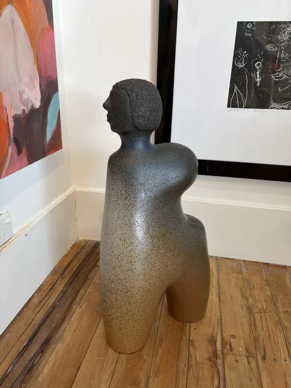 A handmade clay figure sculpture by Ian Webster, available at The Little Gallery Tairua