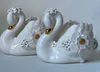 Delicate ceramic Swan ornaments by New Zealand artist Dawn Clayden, available at The Little Gallery Whangamata