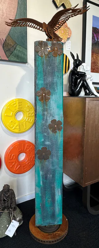 Kahu totem with corten steel flowers by Artist Rustic Soul Sculptures