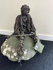 Mixed Media Fisherman sculpture by Shona MacDonald, available at The Little Gallery Tairua