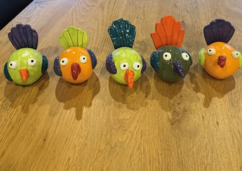 Ceramic colorful birds by artist Rhonda Webb - available at The Little Gallery in Tairua