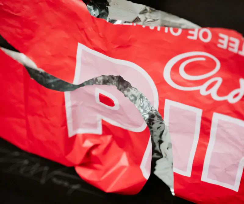 Pinky is A limited edition print by Simon Lewis Wards of the Pinky Bar wrapper available at The Little Gallery Whangamata and Tairua