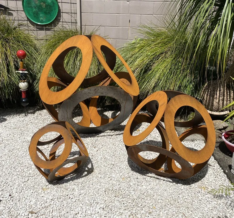 Rusty Corten Steel Sphere garden art by Rustic Soul Sculptures, available at The Little Gallery Tairua